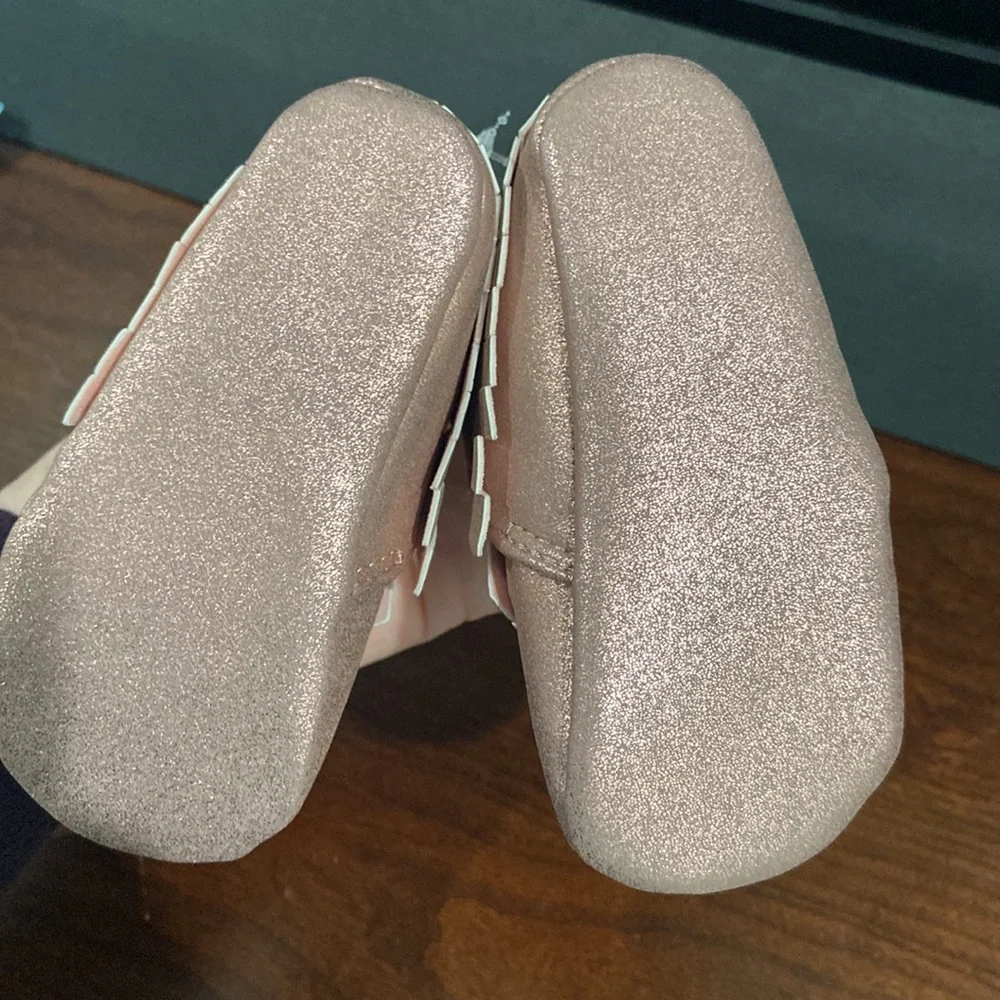Pink shimmery, baby moccasins 6–9 months only worn for a photo shoot